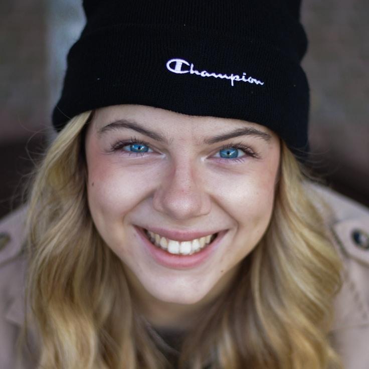 Mira Chen, Lead Design Curator at Innovative Process Hub, reviewing corporate floral arrangements