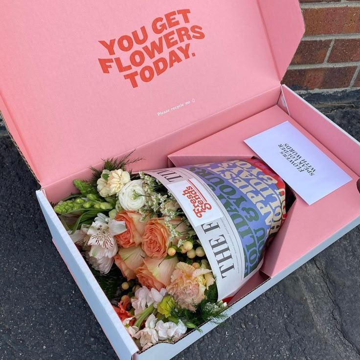 Innovative Process Hub workshop space where corporate flower arrangements are designed and prepared for business delivery